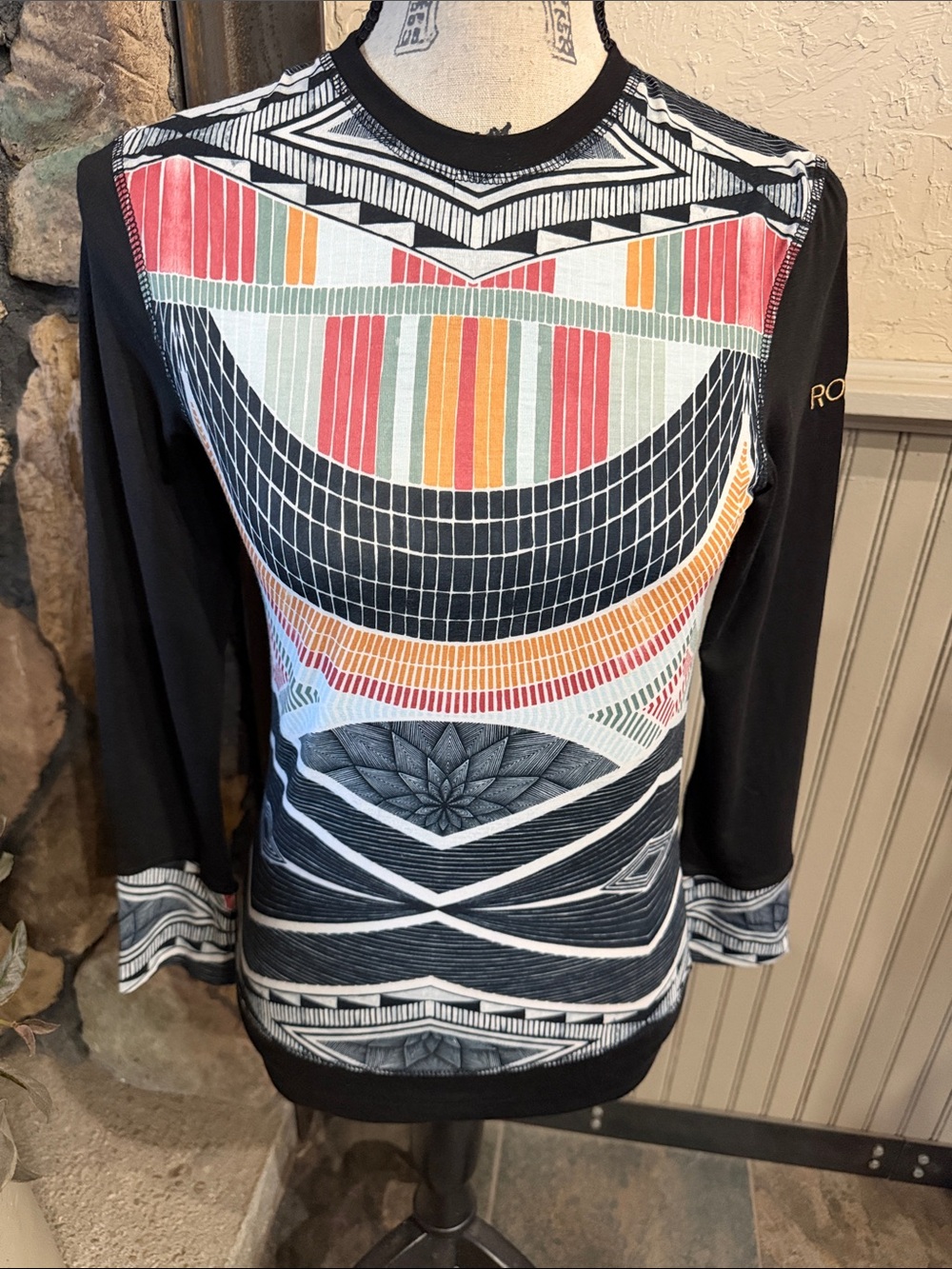 Roxy Black Long Sleeve Tee with Coral, Orange, Yellow & Aqua Geometric Front
